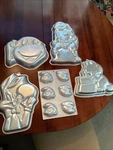 5 Piece Lot Vintage Wilton Cake Pans Smurfs, Garfield, Bugs Bunny Ninja Turtles. Fixed Price $25.50.