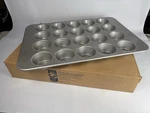 Case 6 Chicago Metallic 44705 20 Cup 8.2 Oz Glazed Aluminized Steel Muffin Pan. Fixed Price $175.00.
