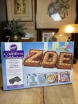 Wilton Countless Celebrations Cake Pan Set 10PCS 070896908018. Fixed Price $24.99.