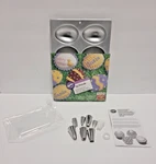 Vtg 1989 Wilton Easter Egg Minicake Pan Aluminum And Decorating Tips W/bags. Fixed Price $15.99.