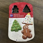 Wilton Cake Pan 2105-0882 Christmas Tree & Gingerbread Man 6 Cavity New. Fixed Price $10.00.