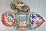 Lot Of 4 Vintage Wilton Character Pans Nascar, Clown, Computer, Castle - New/euc. Fixed Price $23.74.