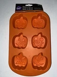 Wilton Pumpkin Faces Silicone Halloween Treat Mold (new). Fixed Price $15.00.