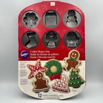Christmas Cookie Shapes 12-CAVITY Pan Wilton 2105-8122 Snowman Mitten Angel Nip. Fixed Price $16.99.