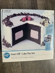 Wilton Fanci-fill Pan Set For Cream Filled Cakes. Fixed Price $9.99.