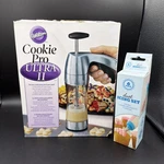 Wilton Cookie Pro Ultra Ii Press Set 16 Disks Includes Duet Icing. Fixed Price $27.88.