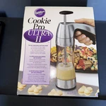 Wilton Cookie Pro Ultra Ii Press Set, 17 Shaping Discs, Easy Grip, Silver. Fixed Price $25.00.