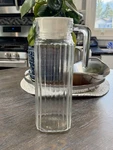 Vintage France Ribbed Glass Pitcher W/ Plastic Lid Luminarc Style. Fixed Price $14.00.