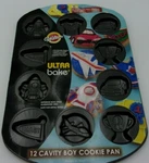 Wilton 12 Cavity Cookie Pan Cars, Space Ships, Planes, Jerseys & Trophys. Fixed Price $23.99.