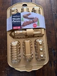 Nordic Ware Express Train Cars Cake Pan Mold 9 Different Metal Holiday Gold. Fixed Price $48.50.