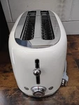 Smeg Retro Style 4 Slice 2-SLOT Toaster In Cream Long New, Open Box. Fixed Price $189.95.