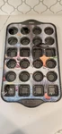 Home Pivot Non-stick 24 Count Mini Muffin Tray, Grey. Fixed Price $35.00.