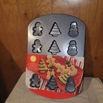 Wilton Cookie Pan 12-CAVITY Non Stick Holiday 3 Designs Brand New!. Fixed Price $12.99.