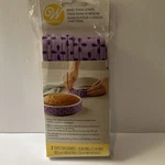 New Wilton 2 Piece Bake Even Strip Set - 35 Inches Long X 1 Wide. Fixed Price $11.87.