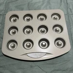 New Wilton 12 Cavity Mini Donut Baking Pan. Fixed Price $9.00.