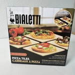 Bialetti 3 Of The 4-PIECE Set Pizza Tiles. Fixed Price $15.33.