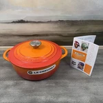 Creuset Enameled Cast Iron Shallow Round Oven 2.75 Qt. Flame Scuffed Read. Fixed Price $219.95.