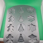 Christmas Cookie Pan Wilton Non-stick Baking Gingerbread Man Tree Snowflake. Fixed Price $12.00.