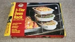 Nib New Heavy Duty Chrome Wilton 3 Tier Oven Rack Collapsible For Storage. Fixed Price $12.99.