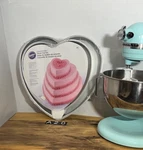 Wilton 2105-606 Cake Pan 4-TIER Heart Set A21. Fixed Price $69.00.