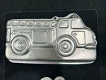 Wilton Fire Truck Cake Pan Vintage Rescue #2105-2061. Fixed Price $19.00.