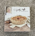 Dolly Parton 9.25" Round Glass Pie Plate & Wicker Basket Set. Fixed Price $16.79.