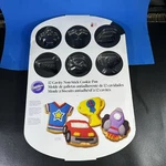 New! Wilton Non-stick Cookie Sheet Pan 12 Shapes Boys Birthday Party. Fixed Price $10.00.