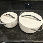 Caraway Cream Ceramic Four-piece Set Non-stick Saucepan Casserole With Lids. Fixed Price $200.00.