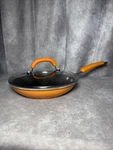 Rachael Ray Stainless Steel Skillet Frying Pan With Lid Orange Handle 10 Inch. Fixed Price $18.00.