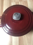 Guy Fieri Cast Iron Porcelain 5.5 Quart Red Dutch Oven Pot Stovetop Cookware. Fixed Price $30.00.