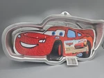 Wilton Disney Pixar Cars Lightning Mcqueen Cake Pan Mold & Paper Insert. Fixed Price $15.00.