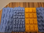 Wilton Silicone Mold Ice Cream Alphabet Bear Dinosaur Heart Diamond Lot Of 7. Fixed Price $10.00.