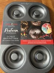 Nordic Ware 30042 6 Cavity Donut Pan. Fixed Price $25.00.