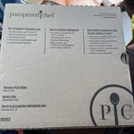 Pampered Chef Personal 9 Pizza Handles 100253 Stoneware-new In Box. Fixed Price $40.00.