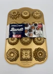 Nordic Ware Charms Cast Bundt Pan, 1.2 Cup Capacity, Gold New. Fixed Price $19.88.