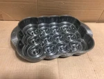Wilton Mini Bundt Cake Pan 12 Cavity Muffin Size Pumpkin 13 7/8" X 9 5/8". Fixed Price $24.99.