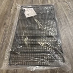 New Pampered Chef #1587 One Black Stackable Cooling Rack Rectangle Sealed Bake. Fixed Price $23.80.