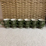 Temptations Floral Lace Green/white 16 Oz Pedestal Mug Set Of PPP-SQ-832942. Fixed Price $50.00.