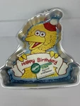 Wilton Sesame Street Big Bird W/banner Cake Pan 2105-3654. Fixed Price $17.00.