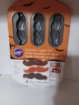 Wilton Bakeware Mustache Cookie Pan Non Stick 6 Cavities New. Fixed Price $15.00.