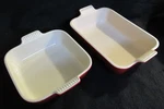 2 Le Creuset Stoneware Cerise Baking Dishes. Fixed Price $69.95.
