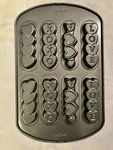 Wilton Valentine 8-CAVITY Cookie Sticks Holiday Baking Pan Hearts & Love Xoxo. Fixed Price $18.00.
