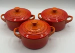 Le Creuset Flame Orange Mini Cocotte Small Lidded Stoneware Dish Of Three. Fixed Price $125.99.