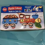 Wilton Puzzle Cakes! Build-a-cake Set Complete Original Box 2007 New Nib. Fixed Price $10.00.