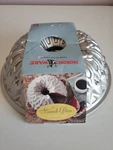 Nordic Ware 88737 Stained Glass Bundt Pan 9 Cup. Fixed Price $32.88.