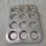 Wearever 12-CUP Aluminum Muffin Pan Silver Oven Safe Rectangle Pat 4595120. Fixed Price $15.00.