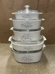Corningware 5 Piece Ceramic Casserole Set W/ Glass Lids Cornflower Pattern. Fixed Price $200.00.
