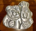 Wilton Cake Pan Lot- Burt & Ernie, Big Bird, Bambi, Minnie Mouse, Hollie Hobbie. Fixed Price $18.00.