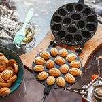 16 Cavity Walnut Cake Mold Oval Waffle Pan Gas Stove Egg Puff Baking Tray Tools. Fixed Price $20.93.