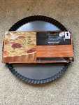 Chicago Metallic 10X1IN Quiche Pan Brand New Never Used. Fixed Price $30.00.